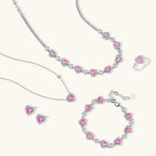 Pink heart-shaped cubic zirconia jewelry set with white gold plating featuring necklace, earrings, bracelet and ring