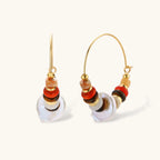18k gold-plated earrings featuring baroque pearls and colorful natural stones in a stacked design on cream background.
